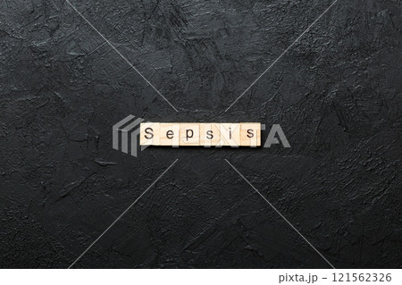 Sepsis word written on wood block. Sepsis text on cement table for your desing, concept 121562326