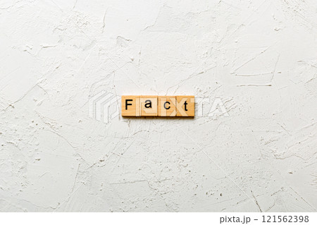 extrovert word written on wood block. extrovert text on table, concept extrovert word written on wood block. extrovert text on table, concept 121562398