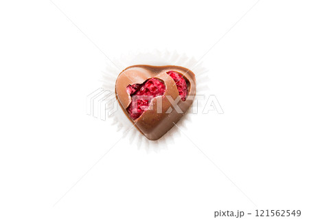 top view of chocolate pralines in heart form isolated on white background top view of chocolate pralines in heart form isolated on white background 121562549