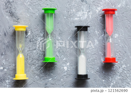 hourglass on the table, sand clock as time passing concept for business deadline, copy space hourglass on the table, sand clock as time passing concept for business deadline, copy space 121562690
