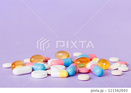 Many different colorful medication and pills perspective view. Set of many pills on colored background 121562693