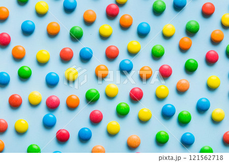 colorful candies as background top view. Seamless pattern with candy. Many sweet candies close-up colorful candies as background top view. Seamless pattern with candy. Many sweet candies close-up 121562718