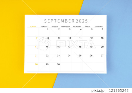 September 2025 calendar page on yellow and blue background. September 2025 calendar page on yellow and blue background. 121565245
