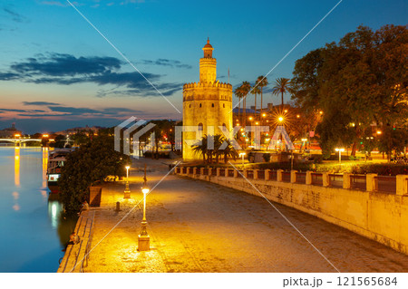 The famous Golden Tower in Seville at sunset. The famous Golden Tower in Seville at sunset. 121565684