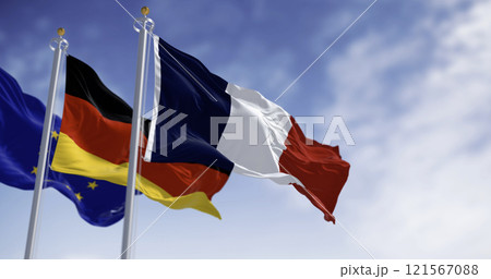 Flags of France, Germany and European union waving in the wind on a clear day 121567088
