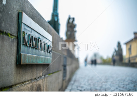 Bronze Sign On Charles Bridge: Gateway To Prague's Most Exciting Sights 121567160