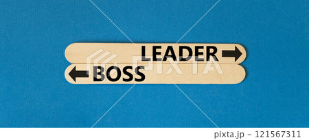 Leader or boss symbol. Concept word Leader or Boss on beautiful wooden stick. Beautiful blue table blue background. Business and leader or boss concept. Copy space. Leader or boss symbol. Concept word Leader or Boss on beautiful wooden stick. Beautiful blue table blue background. Business and leader or boss concept. Copy space. 121567311