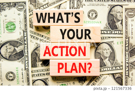 Action plan symbol. Concept words What is your action plan on beautiful wooden blocks. Dollar bills. Beautiful background from dollar bills. Business What is your action plan concept. Copy space 121567336