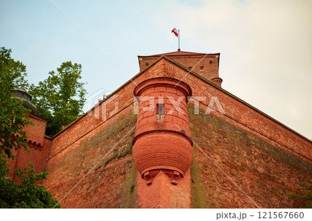 The old red brick Zamek Krolewski na Wawelu castle in the center of Krakow. The old red brick Zamek Krolewski na Wawelu castle in the center of Krakow. 121567660