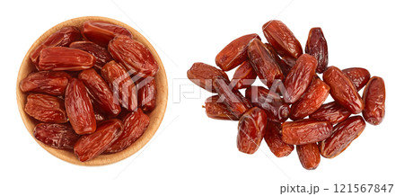 Dates in wooden bowl isolated on white background . Top view. Flat lay 121567847