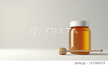 Honey in glass jar with wooden dipper. Pure honey in clear glass, minimalistic style. Concept of healthy eating, food simplicity, natural products, and clean design. Banner. Copy space. 121569153