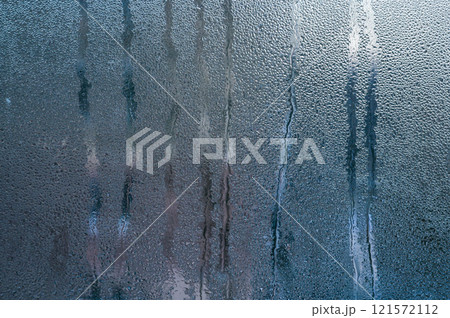 Water droplets on the glass. 121572112
