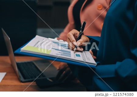 Business meetings to analyze investment strategies and brainstorm sales plans for a more profitable business. Business meetings to analyze investment strategies and brainstorm sales plans for a more profitable business. 121574380