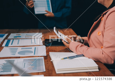 Business meetings to analyze investment strategies and brainstorm sales plans for a more profitable business. Business meetings to analyze investment strategies and brainstorm sales plans for a more profitable business. 121574386