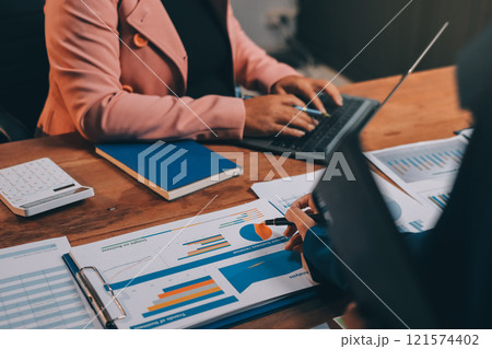 Business meetings to analyze investment strategies and brainstorm sales plans for a more profitable business. Business meetings to analyze investment strategies and brainstorm sales plans for a more profitable business. 121574402