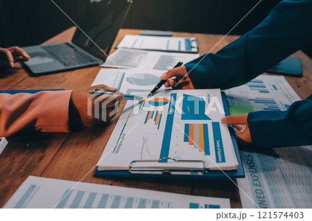 Business meetings to analyze investment strategies and brainstorm sales plans for a more profitable business. Business meetings to analyze investment strategies and brainstorm sales plans for a more profitable business. 121574403