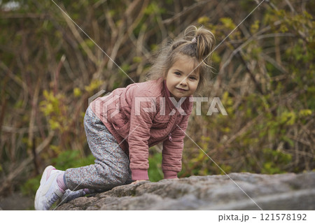 Charming child playing on a playground in Denmark 121578192