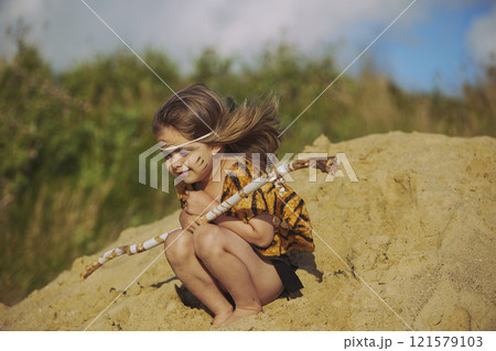 Cute baby dressed in the clothes of primitive people Cute baby dressed in the clothes of primitive people 121579103