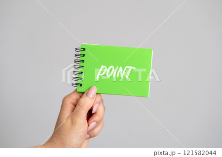 Notebook with the word Point in female hands. Point or destination. Gist business concept 121582044