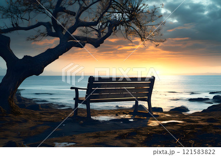 bench for rest on the shore of the lake near a tree against the backdrop of sunset 121583822