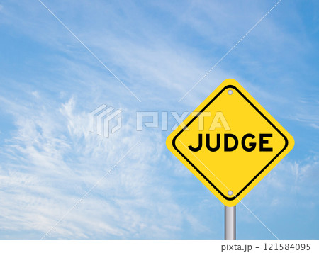 Yellow transportation sign with word judge on blue color sky background 121584095