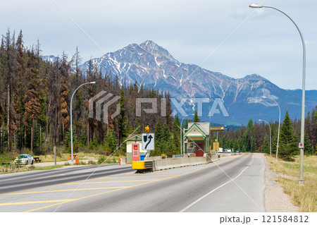 Icefields Parkway (Alberta Highway 93) toll to the town of Jasper. Pyramid Mountain in the background. Jasper, Alberta, Canada. Icefields Parkway (Alberta Highway 93) toll to the town of Jasper. Pyramid Mountain in the background. Jasper, Alberta, Canada. 121584812