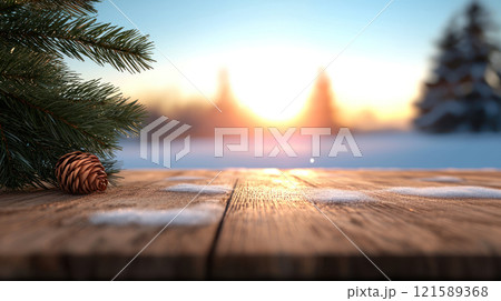 Winter landscape with wooden table, pine cone, and sunlight 121589368