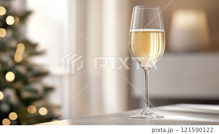 celebratory white wine glass filled with champagne, perfect for festive moments 121590122