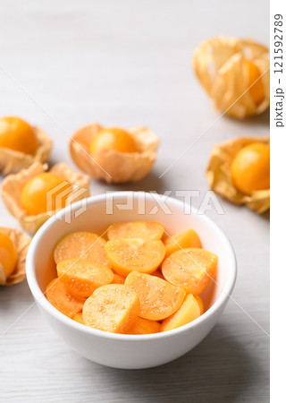 Fresh Cape gooseberry or Golden berry (Physalis peruviana) in bowl ready to eating, Healthy fruit Fresh Cape gooseberry or Golden berry (Physalis peruviana) in bowl ready to eating, Healthy fruit 121592789