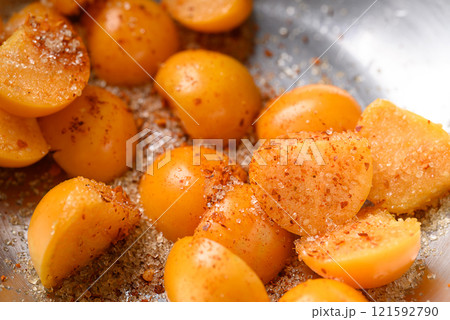 Cape gooseberry or Golden berry (Physalis peruviana) with chili powder and sugar, Spicy fruit salad Cape gooseberry or Golden berry (Physalis peruviana) with chili powder and sugar, Spicy fruit salad 121592790