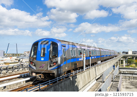 View of a Taoyuan International Airport line train running on the elevated track of the Taoyuan Mass Rapid Transit System. 121593715