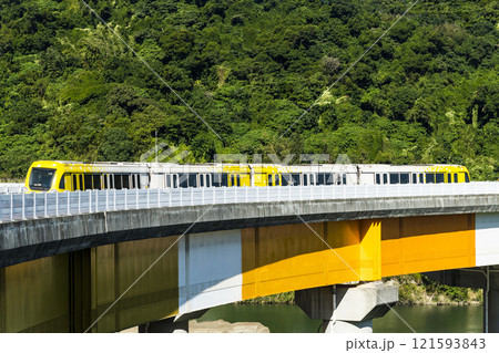 A train traveling on the Circular Line (Yellow Line) metro in New Taipei City, Taiwan, The metro with driverless technology. 121593843