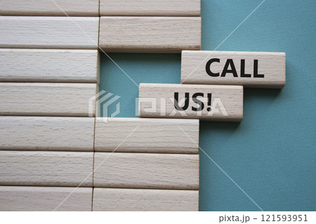 Call Us symbol. Wooden blocks with words Call Us. Beautiful grey green background. Business and Call Us concept. Copy space. Call Us symbol. Wooden blocks with words Call Us. Beautiful grey green background. Business and Call Us concept. Copy space. 121593951
