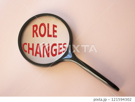 Role changes symbol. Concept words Role changes on magnifying glass. Beautiful pink background. Business and Role changes concept. Copy space. Role changes symbol. Concept words Role changes on magnifying glass. Beautiful pink background. Business and Role changes concept. Copy space. 121594302