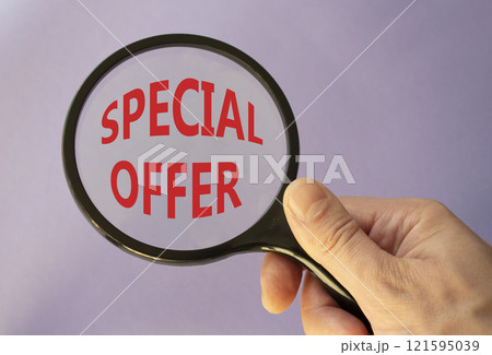 Special offer symbol. Concept word Special offer on wooden blocks. Businessman hand. Beautiful purple background. Business and Special offer concept. Copy space 121595039