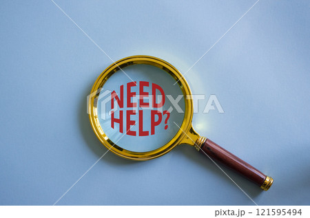 Need Help symbol. Magnifying Glass with Concept word Need Help. Beautiful blue background. Business and Need Help concept. Copy space 121595494