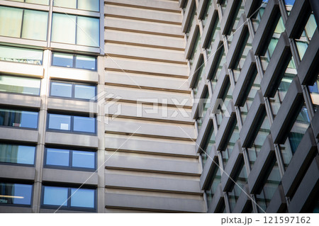 Modern high-rise buildings. Building facade. Concrete and glass 121597162