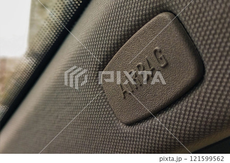 Forehead level cover badge lettering Air Bag on car body pillar to save passenger's life during collision, accident 121599562