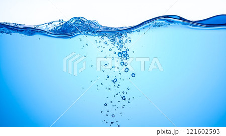 Bubbles rising through clear blue water highlighting a serene underwater view at midday 121602593