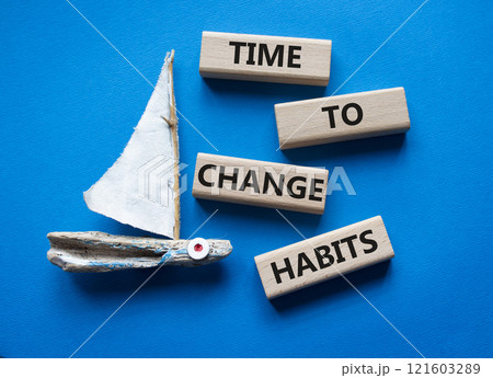 Time to Change Habits symbol. Wooden blocks with words Time to Change Habits. Beautiful blue background with boat. Psychology and Time to Change Habits concept. Copy space. 121603289