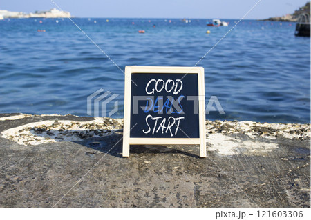 Good Deals Start symbol. Blackboard with words Good Deals Start. Beautiful sea background. Business and Good Deals Start concept. Copy space. Good Deals Start symbol. Blackboard with words Good Deals Start. Beautiful sea background. Business and Good Deals Start concept. Copy space. 121603306
