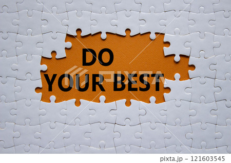 Do your Best symbol. Concept words Do your Best on white puzzle. Beautiful orange background. Business and Do your Best concept. Copy space. 121603545