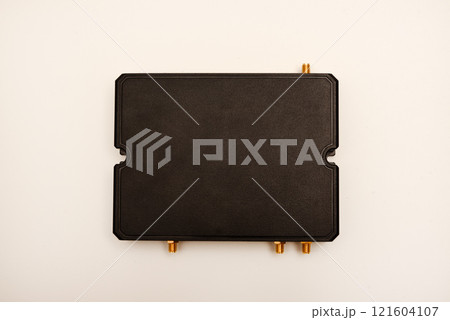 GSM modem. An Internet station with a SIM card. A black router on a white background. GSM modem. An Internet station with a SIM card. A black router on a white background. 121604107