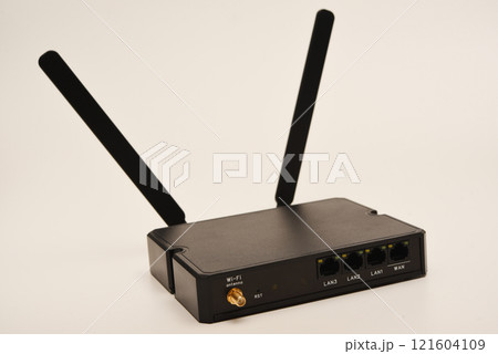 GSM modem. An Internet station with a SIM card. A black router on a white background. 121604109