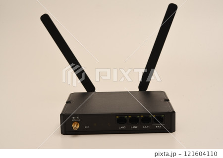GSM modem. An Internet station with a SIM card. A black router on a white background. GSM modem. An Internet station with a SIM card. A black router on a white background. 121604110