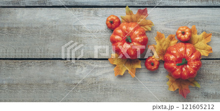 Orange pumpkin. Autumn composition. Autumn, fall, halloween, thanksgiving concept. Flat lay, top view, copy space 121605212