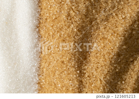 Two types of crystalline sugar are white refined beet sugar and brown unrefined cane sugar. 121605213