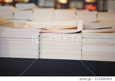 Stacks of Blank Books Positioned Neatly on a Shelf Within a Cozy Space Stacks of Blank Books Positioned Neatly on a Shelf Within a Cozy Space 121606563