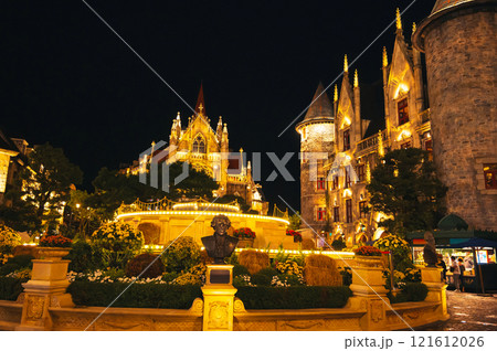 Catholic Cathedral in central square of medieval city in Ba Na Hills Park in Da Nang in Vietnam at night 121612026