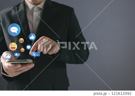 person using smart phone with Social media.Social media and digital online,online marketing, Work From Home. technology internet, playing social media and living on holiday concept. person using smart phone with Social media.Social media and digital online,online marketing, Work From Home. technology internet, playing social media and living on holiday concept. 121612092